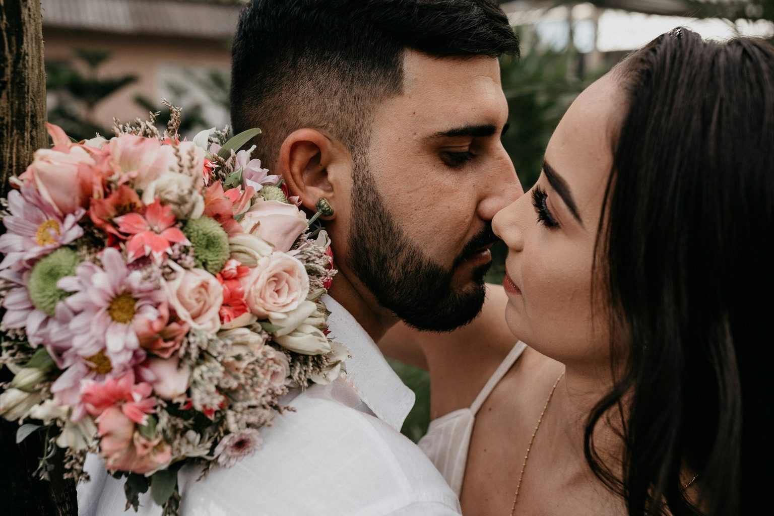 Couple holding flowers during a wedding session